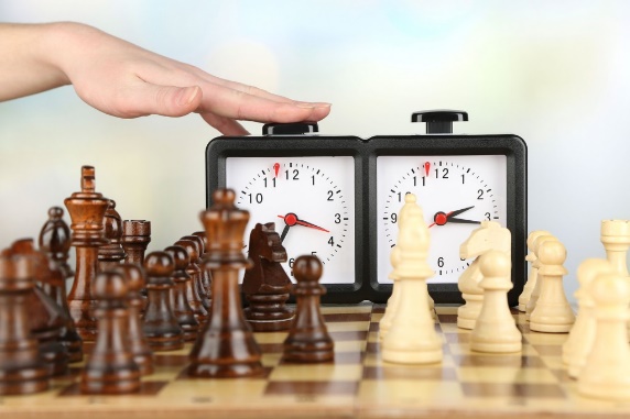 Hand on chess timer